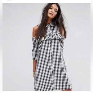 New with tags Beautiful BP. Gingham dress. Size small. Cold shoulder
